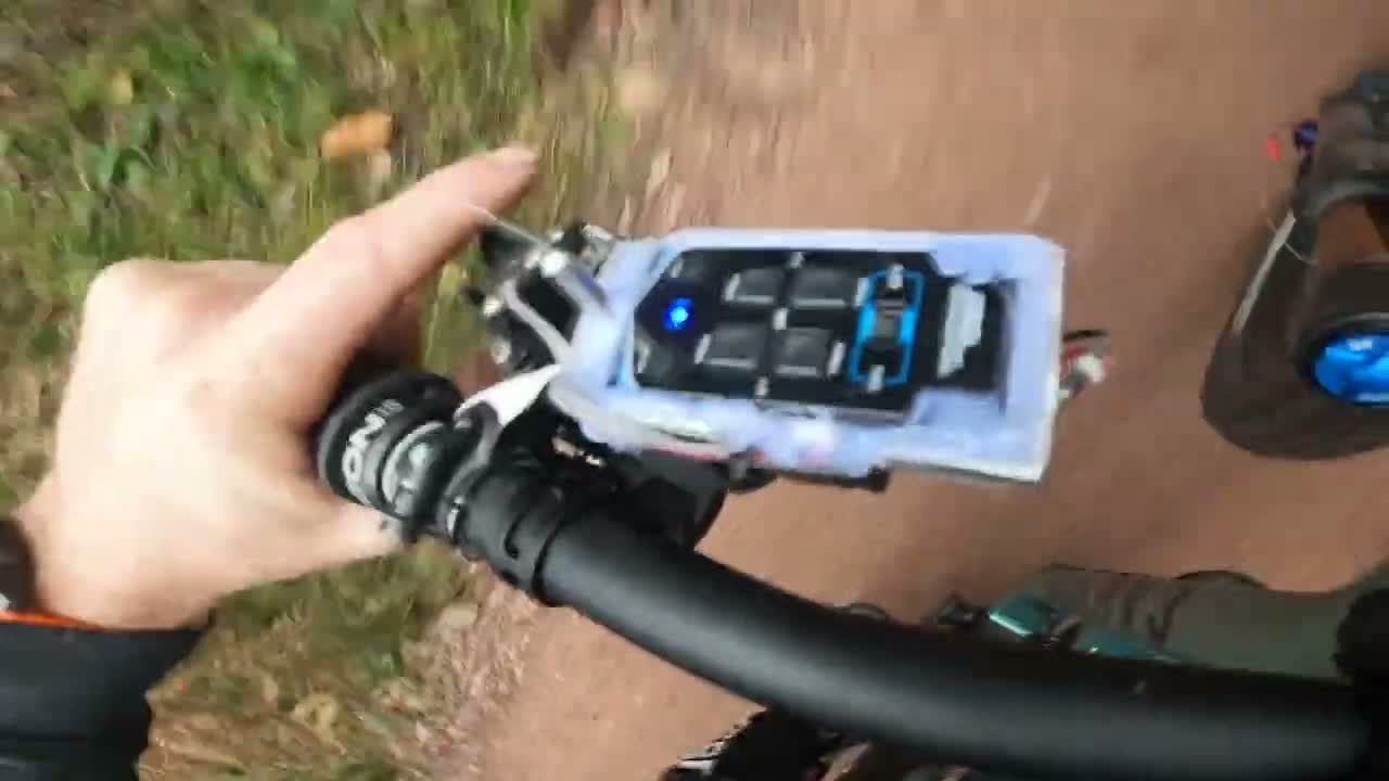 The competition's brake lever: a remote control in a printed box